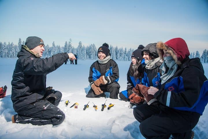Lappish Lunch Break -Snowmobiling, ice fishing and tasty food 3