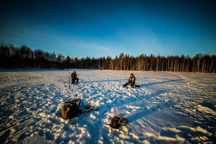 Ice Fishing Excursion with Campfire in Rovaniemi 4