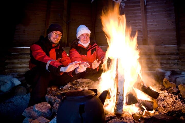Ice Fishing Excursion with Campfire in Rovaniemi 5