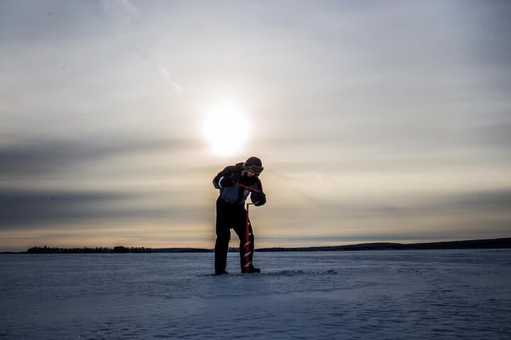 Ice Fishing on a Frozen Lake in Levi 3