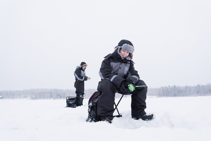Ice Fishing on a Frozen Lake in Levi 4
