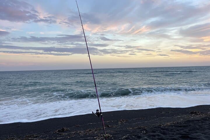 Santorini Fishing on a Peaceful Volcanic Beach 5