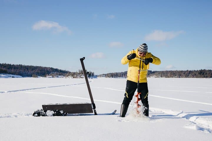 Private Electric Snow Scooter Safari and Ice Fishing in Puumala 2