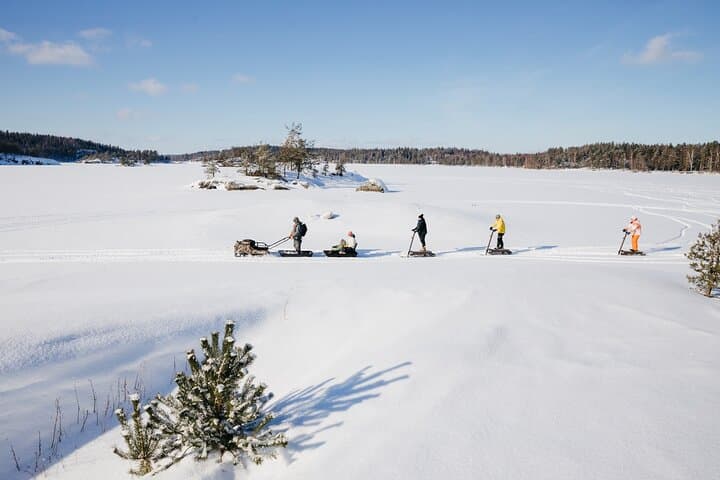 Private Electric Snow Scooter Safari and Ice Fishing in Puumala 4