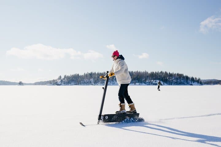 Private Electric Snow Scooter Safari and Ice Fishing in Puumala 5