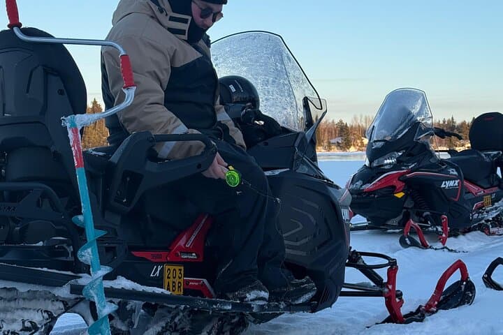 Snowmobiling with Ice Fishing and Aurora Hunt 5