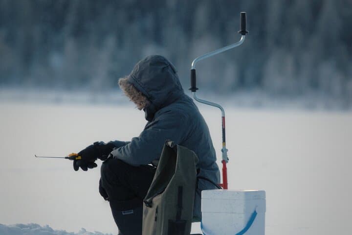 Ice Fishing Adventure in Lapland's Arctic Wilderness in Levi 2