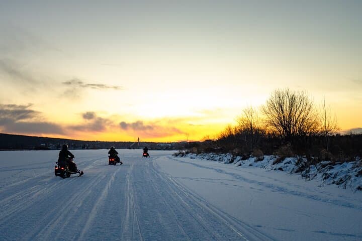 Ice fishing initiation by snowmobile in small group of 6  2