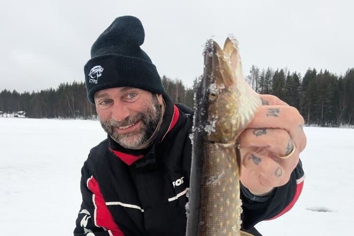 Ice fishing initiation by snowmobile in small group of 6  3